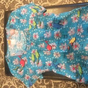 Dr Seuss size XS scrub top.